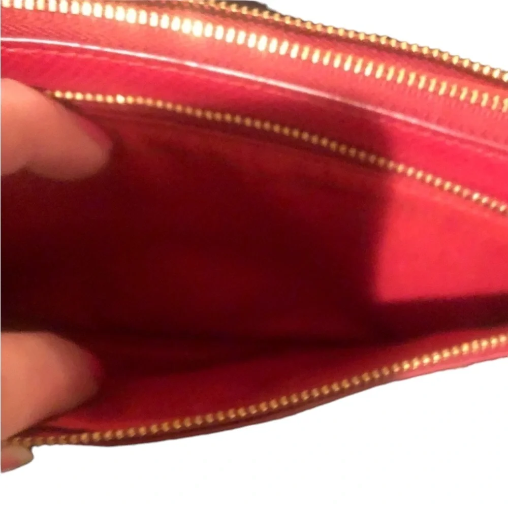 Coach red monogram large zip accordion style wallet with wrist strap